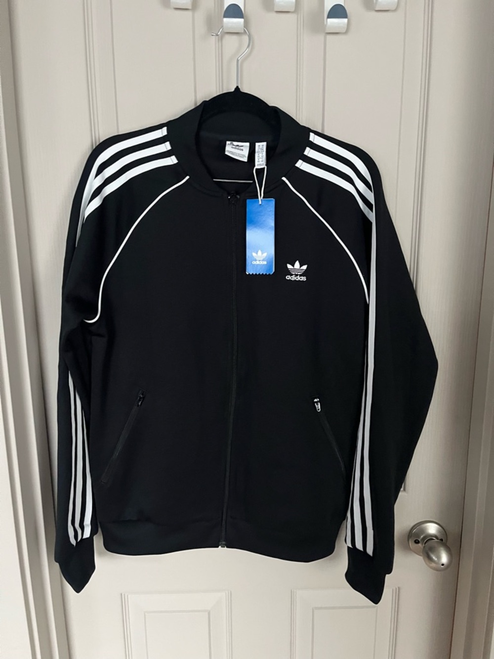adidas Black Track Jacket with White Stripes for juniors, boys or NWT.